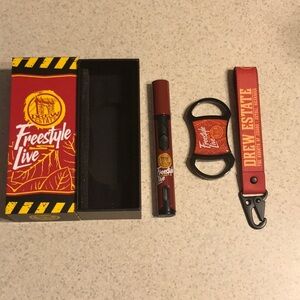 Drew Estate Freestyle Live Swag kit.  Cutter, lighter, key lanyard